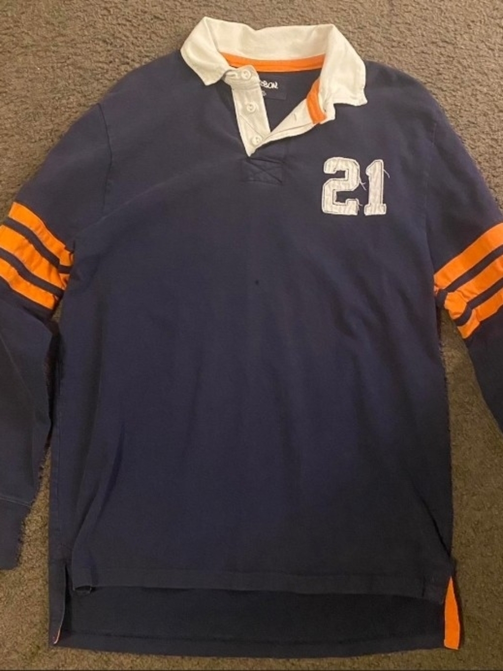 Carbon Navy Rugby Shirt with Orange Sleeve Stripes